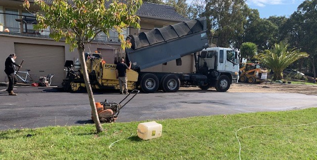 This is a photo of an asphalt driveway which is in the process of being installed by Hurstbridge Road Tech