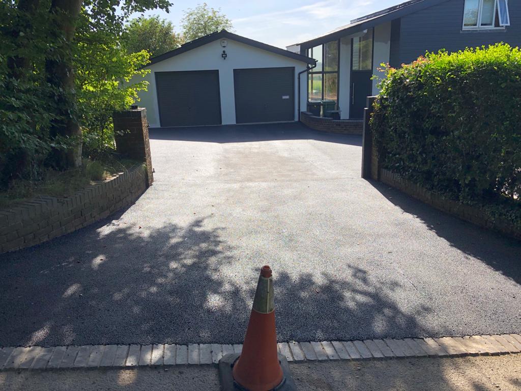 This is a photo of a bitumen driveway which is in the process of being installed by Hurstbridge Road Tech