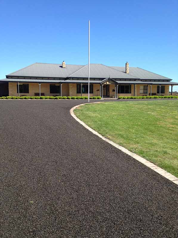 This is a photo of an asphalt driveway which has been installed by Hurstbridge Surfacing Solutions